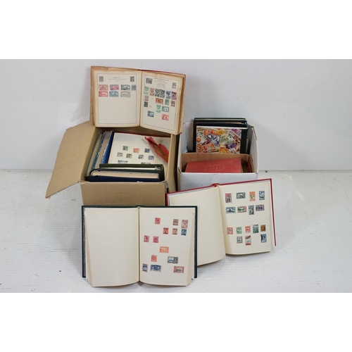 507 - A large collection of British, Commonwealth and world stamps contained within stamp albums together ... 