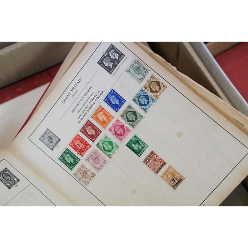 507 - A large collection of British, Commonwealth and world stamps contained within stamp albums together ... 