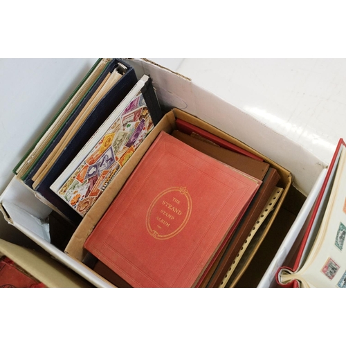 507 - A large collection of British, Commonwealth and world stamps contained within stamp albums together ... 