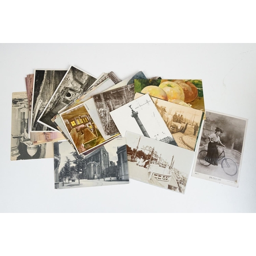 510 - A collection of mainly early 20th century postcards to include printed and real photo examples.