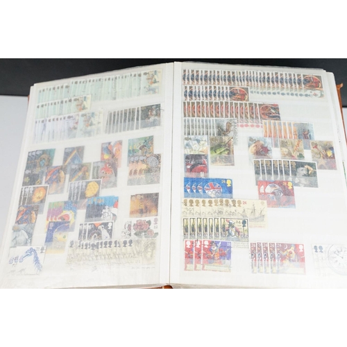 511 - A collection of British and World stamps contained within albums together with loose examples, inclu... 