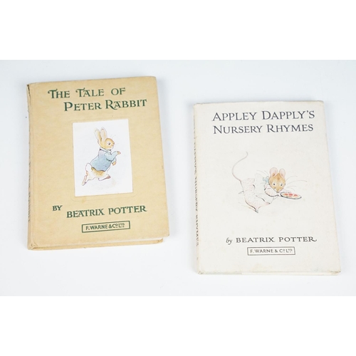 512 - A small collection of vintage children's books to include Winnie the Pooh, Noddy and Beatrix Potter ... 