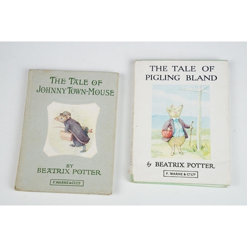 512 - A small collection of vintage children's books to include Winnie the Pooh, Noddy and Beatrix Potter ... 