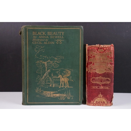 516 - Two antique books to include Mrs Beeton's book of household management dated 1891 together with Blac... 