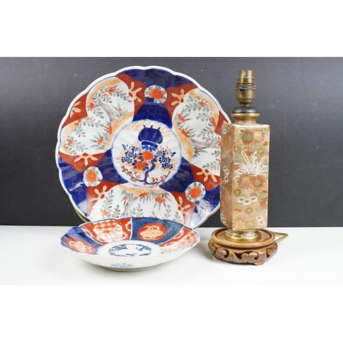 111 - Two Japanese Imari wall charger plates together with a Japanese Satsuma ware lamp base decorated wit... 