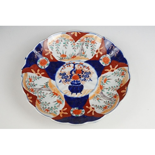 111 - Two Japanese Imari wall charger plates together with a Japanese Satsuma ware lamp base decorated wit... 