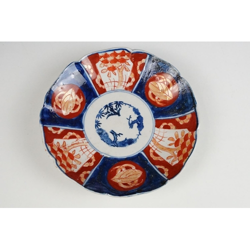 111 - Two Japanese Imari wall charger plates together with a Japanese Satsuma ware lamp base decorated wit... 