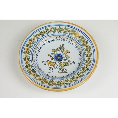 114 - Two Spanish Faience plates together with two Lord Nelson Limited edition cups produced for the Royal... 