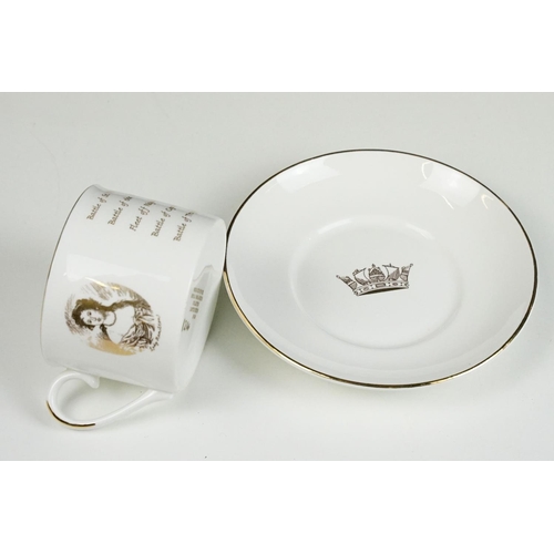 114 - Two Spanish Faience plates together with two Lord Nelson Limited edition cups produced for the Royal... 