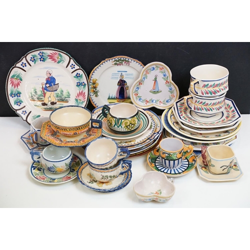 107 - Collection of French Quimper faience ceramics to include mostly Henriot and HB factories, the lot to... 