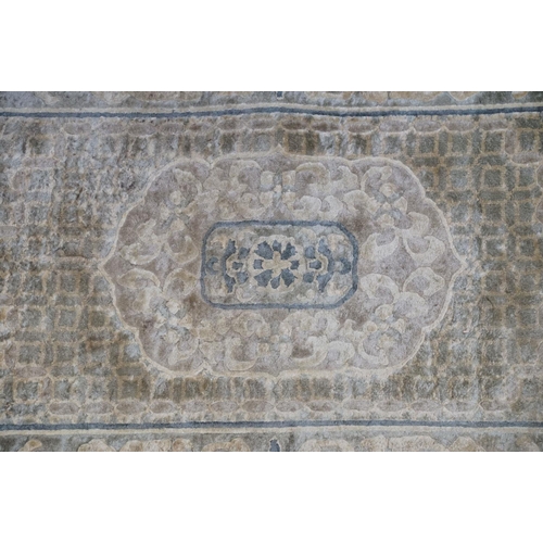 696 - Chinese part Silk Pale Ground Rug, 122cm x 63cm