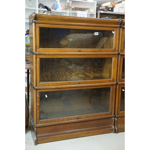 699 - Early 20th century Globe Wernicke Oak Three Section Modular Bookcase, each section with plain glazed... 