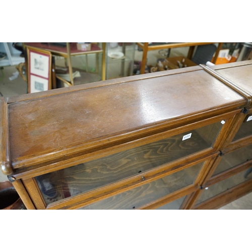 699 - Early 20th century Globe Wernicke Oak Three Section Modular Bookcase, each section with plain glazed... 