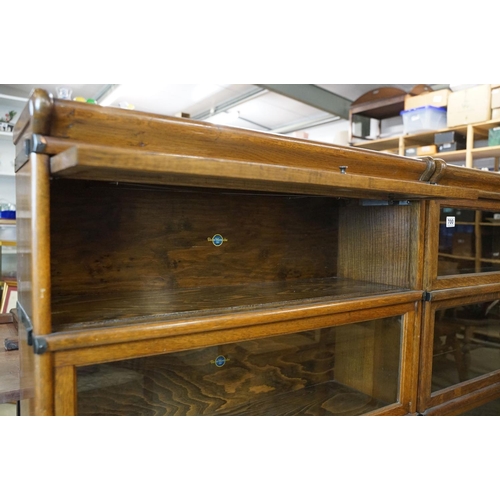 699 - Early 20th century Globe Wernicke Oak Three Section Modular Bookcase, each section with plain glazed... 