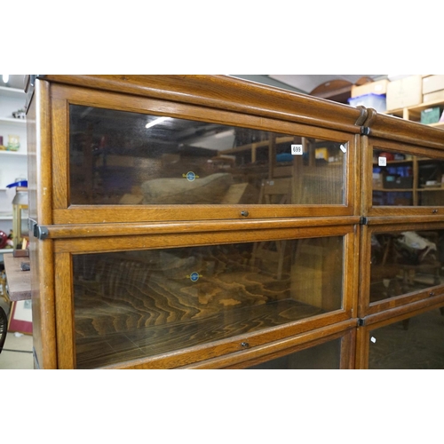 699 - Early 20th century Globe Wernicke Oak Three Section Modular Bookcase, each section with plain glazed... 