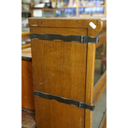 699 - Early 20th century Globe Wernicke Oak Three Section Modular Bookcase, each section with plain glazed... 