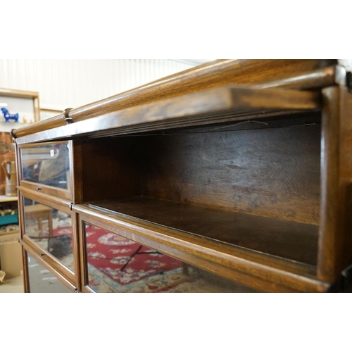 700 - Early 20th century Globe Wernicke Oak Three Section Modular Bookcase, each section with plain glazed... 