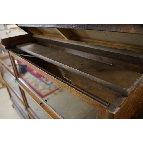 700 - Early 20th century Globe Wernicke Oak Three Section Modular Bookcase, each section with plain glazed... 