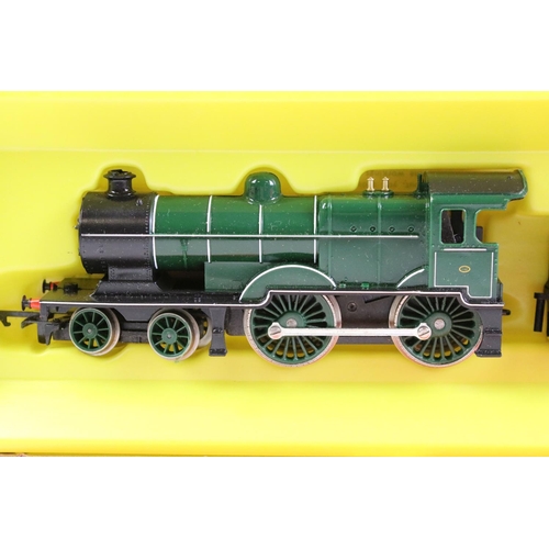 49 - Four boxed Triang Hornby OO gauge locomotives to include R157C Local Two Car Diesel Train, R52 RS LM... 