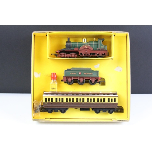 49 - Four boxed Triang Hornby OO gauge locomotives to include R157C Local Two Car Diesel Train, R52 RS LM... 