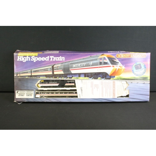 82 - Three boxed OO gauge train sets to include Triang Hornby RS607 Local Passenger Set and 2 x Hornby (R... 