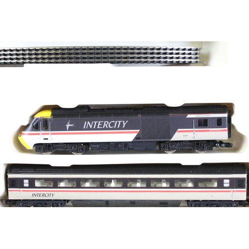 82 - Three boxed OO gauge train sets to include Triang Hornby RS607 Local Passenger Set and 2 x Hornby (R... 