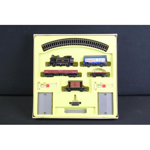 82 - Three boxed OO gauge train sets to include Triang Hornby RS607 Local Passenger Set and 2 x Hornby (R... 