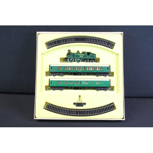 82 - Three boxed OO gauge train sets to include Triang Hornby RS607 Local Passenger Set and 2 x Hornby (R... 