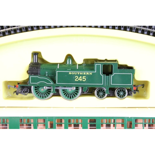 82 - Three boxed OO gauge train sets to include Triang Hornby RS607 Local Passenger Set and 2 x Hornby (R... 