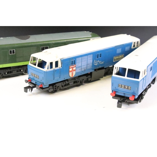 91 - Three Triang plastic O gauge locomotives to include 2 x Blue Flier and a D7099 plus an O gauge batte... 