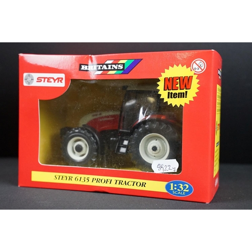 102 - Collection of seven boxed Britains farming tractor diecast models to include Steyr 6135 Profi Tracto... 