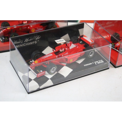 121 - Nine boxed / cased diecast racing car models to include examples from Onyx, Hot Wheels and Minichamp... 