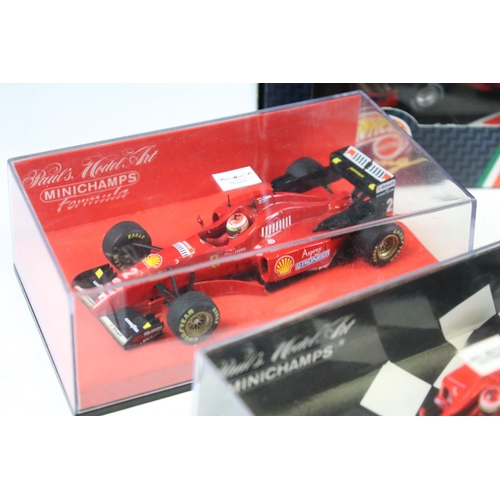 121 - Nine boxed / cased diecast racing car models to include examples from Onyx, Hot Wheels and Minichamp... 