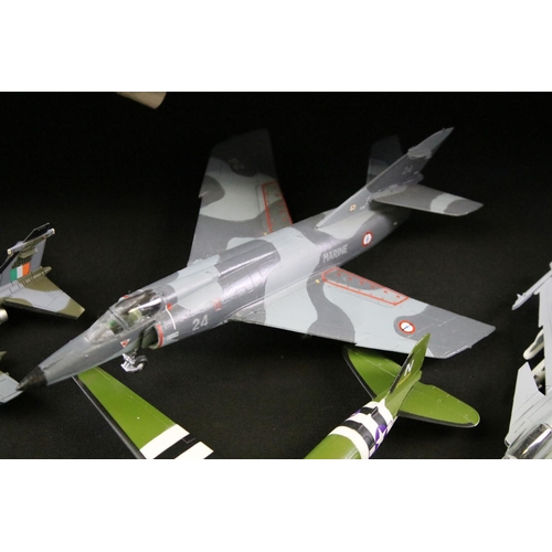 131 - Collection of around 90 model aircraft, mostly kit built military plastic models, also featuring a s... 