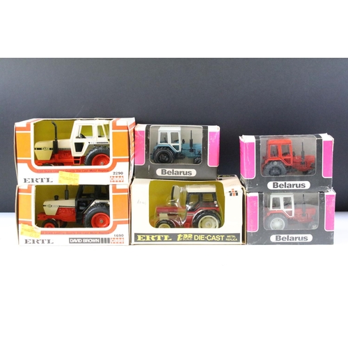 152 - Ten boxed farming tractor related diecast models to include 7 x ERTL models featuring Case David Bro... 