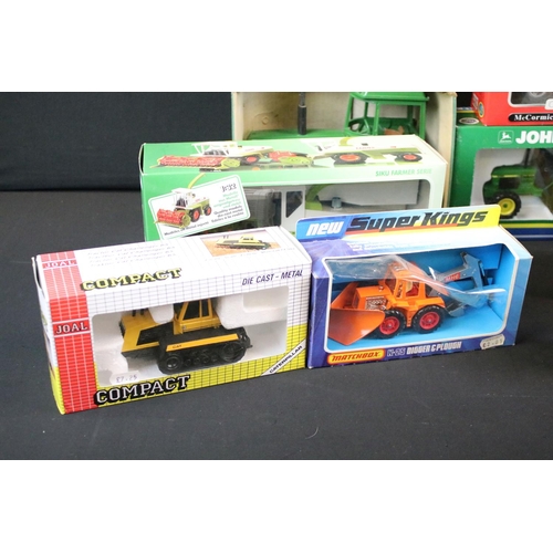 153 - Collection of 11 boxed farming tractor diecast models to include Matchbox Super Kings K-25 Digger an... 