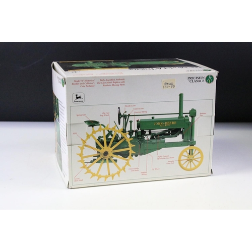 154 - Two boxed farming tractor diecast models to include Britains 9571 New Holland TR85 Combine Harvester... 