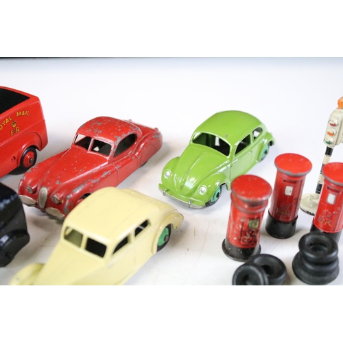 160 - 11 Mid 20th C play worn Dinky diecast models to include Royal Mail Van, 40H Austin Taxi, 172 Studeba... 