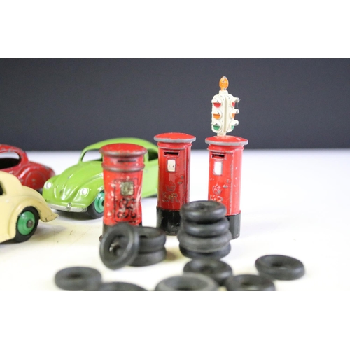 160 - 11 Mid 20th C play worn Dinky diecast models to include Royal Mail Van, 40H Austin Taxi, 172 Studeba... 