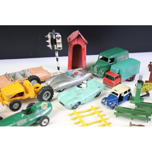 163 - Collection of mid 20th C play worn diecast models to include Corgi, Dinky and Matchbox examples feat... 