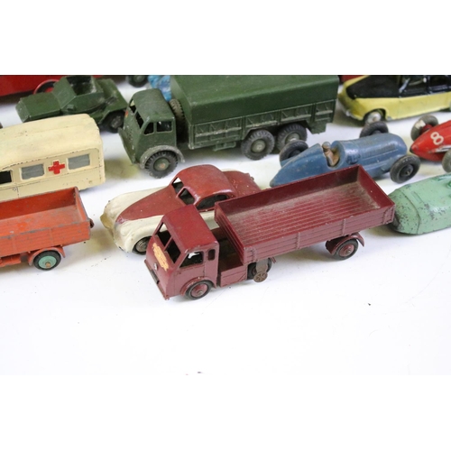 172A - 22 Mid 20th C play worn Dinky diecast models to include Foden, Slumberland Guy, Daimler etc, some re... 