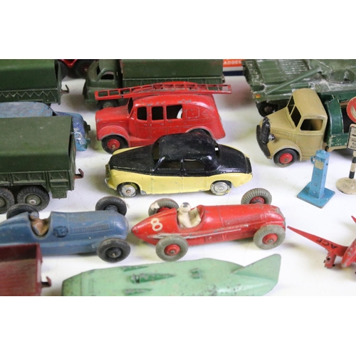 172A - 22 Mid 20th C play worn Dinky diecast models to include Foden, Slumberland Guy, Daimler etc, some re... 