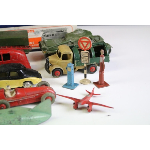 172A - 22 Mid 20th C play worn Dinky diecast models to include Foden, Slumberland Guy, Daimler etc, some re... 