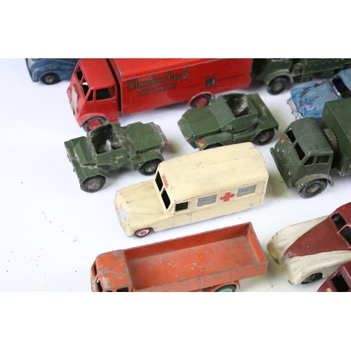 172A - 22 Mid 20th C play worn Dinky diecast models to include Foden, Slumberland Guy, Daimler etc, some re... 