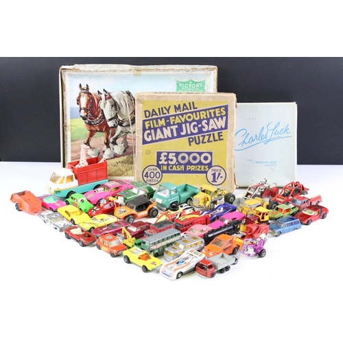 256 - Around 40 play worn diecast models, to include mid 20th C examples, featuring Corgi, Matchbox, Toots... 