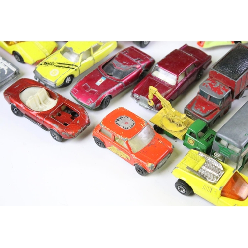 256 - Around 40 play worn diecast models, to include mid 20th C examples, featuring Corgi, Matchbox, Toots... 