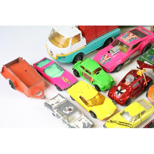 256 - Around 40 play worn diecast models, to include mid 20th C examples, featuring Corgi, Matchbox, Toots... 