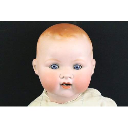 271 - Early 20th C Armand Marseille baby doll with glass sleeping eyes, articulated composition limbs, pai... 