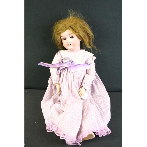 276 - Five early 20th century bisque headed dolls, clothed, with sleeping eyes, composition limbs & painte... 