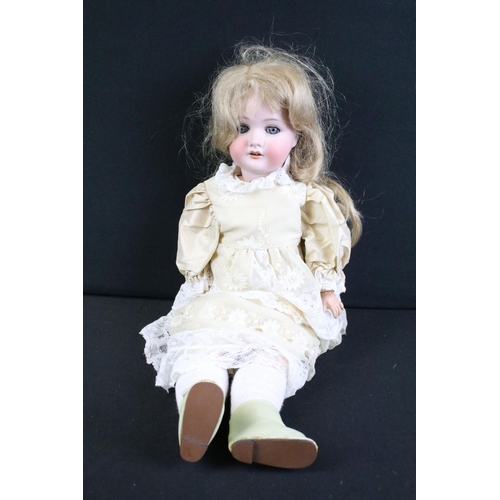 276 - Five early 20th century bisque headed dolls, clothed, with sleeping eyes, composition limbs & painte... 